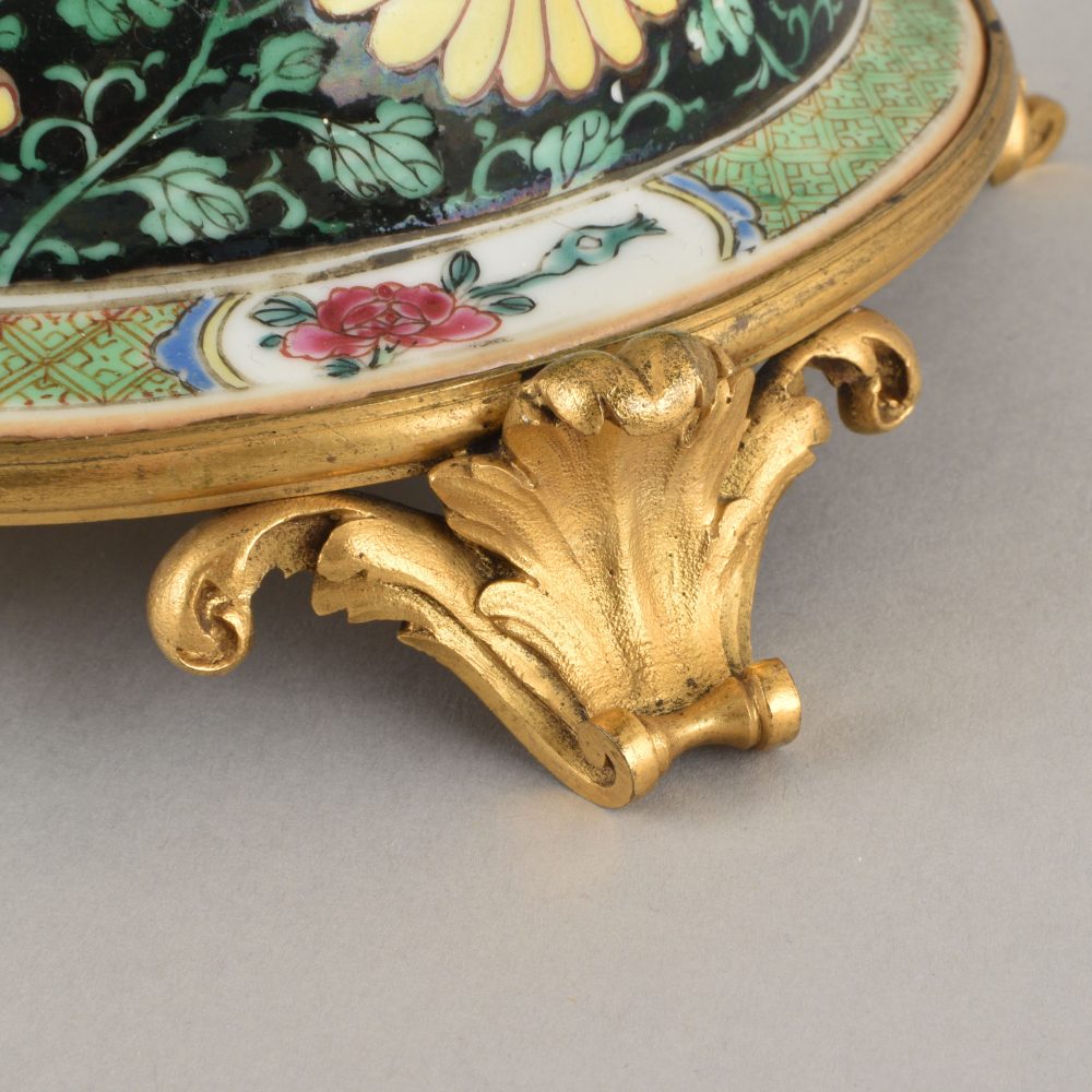 Famille rose Porcelain and bronze gilt Yongzheng period (1723-1735) for the porcelain, 19th century for the bronze gilt, China and France Famille rose Porcelain and bronze gilt Yongzheng period (1723-1735) for the porcelain, 19th century for the bronze gilt, China and France